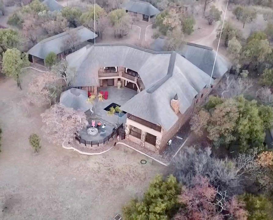 From above, the main house wraps around its courtyard pool