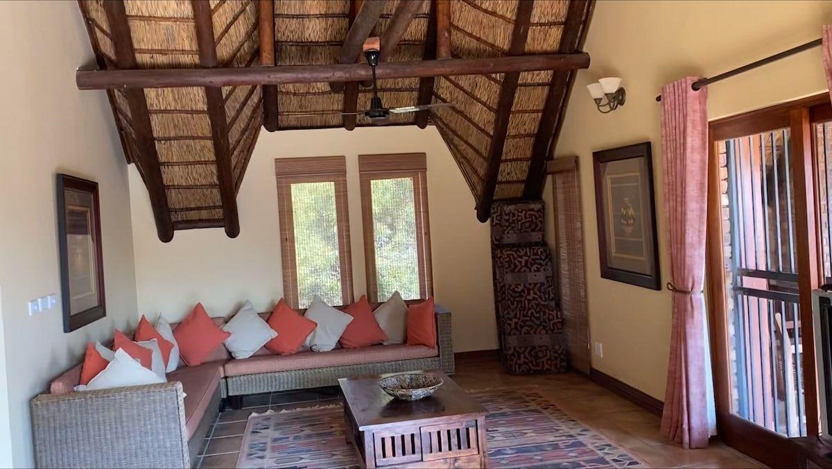 A sitting area in the main bedroom