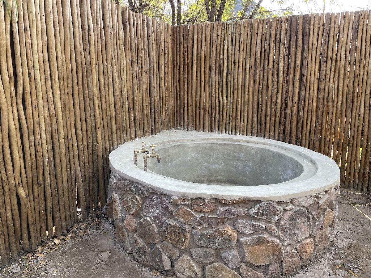 The outdoor stone bath